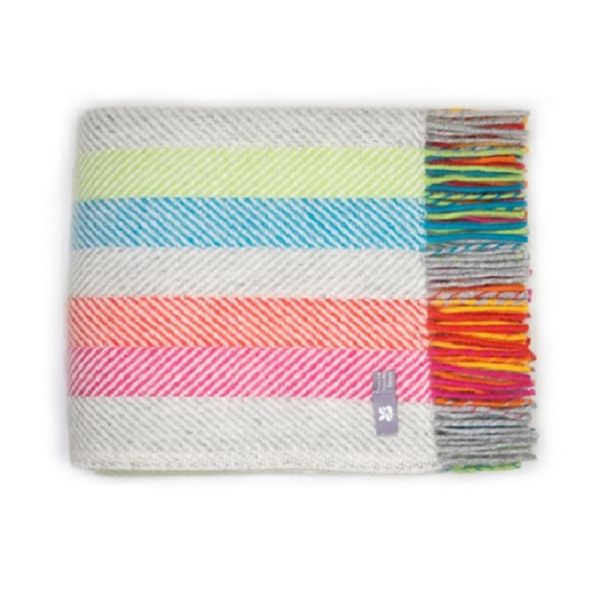 Top down view of Multicolour Fishbone Throw folded with tassels to the right.