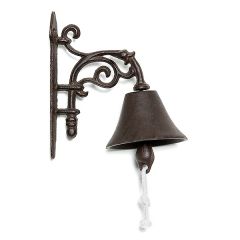 A side view of the traditional cast iron doorbell which hangs in a scroll detailed bracked and has a rope pull attached to the bell