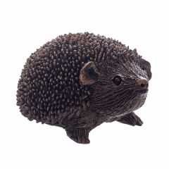 A small bronze finish resin hedgehog looking inquisitively out from the screen with an upturned face