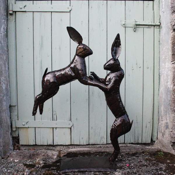 An image of Large Boxing Hares Garden Sculpture