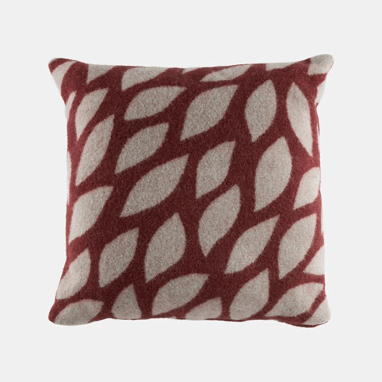 National Trust Cushion - Leaves Red. Image shows square cushion with deep red wool cover decorated with printed cream leaf motifs on a plain grey background.