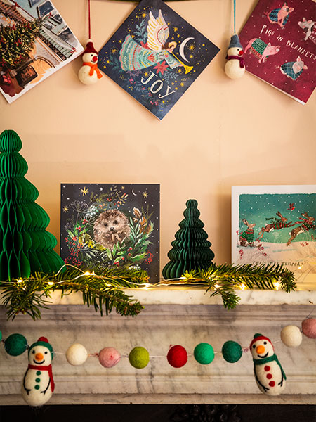 Christmas - image shows a selection of products from the Christmas collection, including charity Christmas cards, sustainable Christmas decorations and LED Christmas lights.