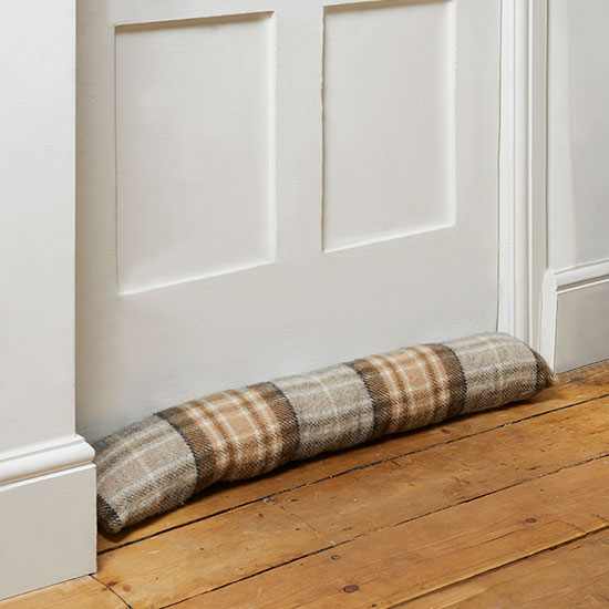 Wool Draught Excluder - McKellar Tartan. Image shows tartan draught excluder against white painted door, with neutral coloured check print to compliment contemporary home decor.