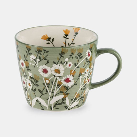 Stoneware Mug - Green Daisy. Image shows green mug with painterly daisy pattern and shiny glaze on a plain grey background.