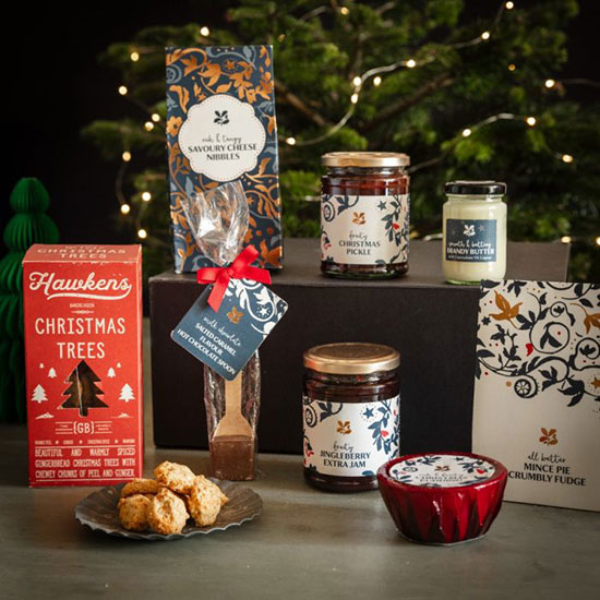 Taste of Christmas Hamper - image shows hamper of National Trust festive food arranged on a smart presentation box.