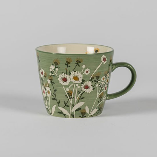Green Daisy Mug (£8.00). Image shows mug, decorated with white and yellow daisies with a green base, on a plain grey background.