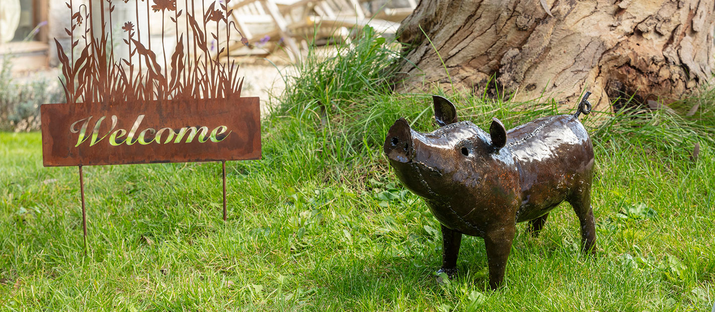 Brighten the garden with decor from the National Trust - whether its sculptures made using recycled oil drums or nature inspired wall art, help fund vital conservation work with every purchase.<