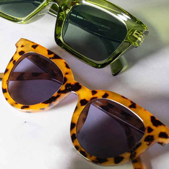 CHPO Sunglasses - Leopard Print (£30.00). Image shows sunglasses folded, laid on a plain background, accompanied by the CHPO Sunglasses - Anna in green.