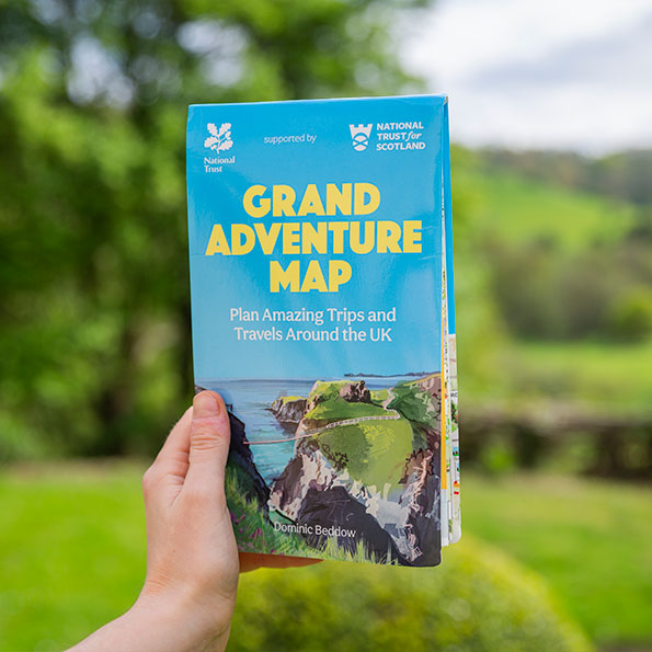 Newly published - National Trust Grand Adventure Map. This image is a gif, which shows front cover of map, with an illustration of a gorge way. This switches to an image of map open, showing routes and places near Edinburgh, Scotland.